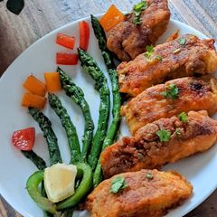 A picture of Panga fry with Asparagus.