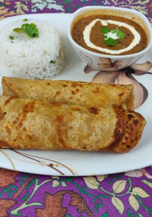 A picture of Daal chawal and paratha.