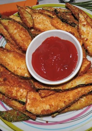 Une photo de Courgettes panées au parmesan