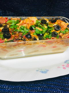 Una foto de Papas Gratinada a la Crema Con Vegetales Salchichas!