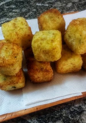 Una foto de Croquetas de arroz y queso