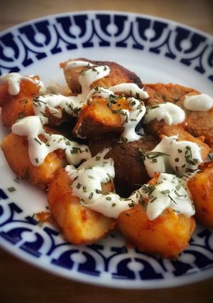 Foto principal de Medallones de solomillo de cerdo al pimentón y salsa de yogur