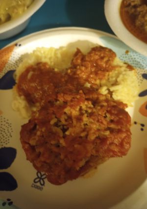 A picture of Stuffed Bell Peppers served with Rice 2023.