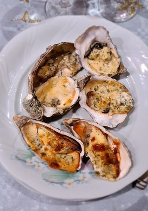 Une photo de Huîtres farcies🦪🧄🌿