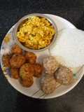 Farali dish sabudana khichdi vada sweet ladoo with papad