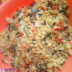 A picture of Crushed Rice and Moringa(Zogale).