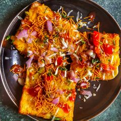 A picture of Open Bombay Masala Cheese Toast - Perfect Tea Time Snack!.