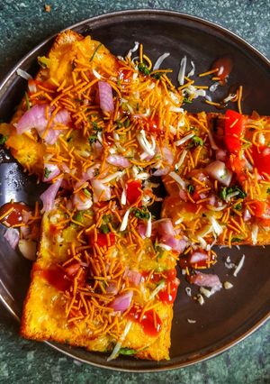 A picture of Open Bombay Masala Cheese Toast - Perfect Tea Time Snack!.