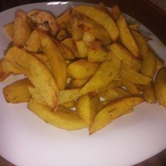 A picture of Baked Potatoes wedges.