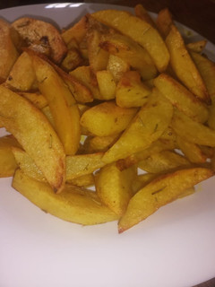 A picture of Baked Potatoes wedges.