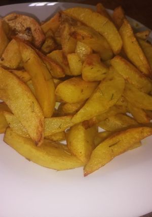 A picture of Baked Potatoes wedges.