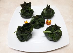 Una foto de Aumônière relleno de setas y queso