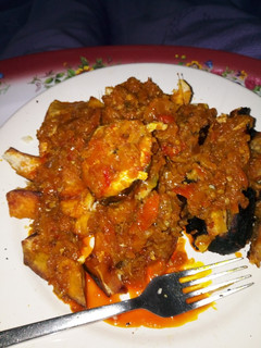 A picture of Roasted / Grilled Yam and Plantain with Peppered fish Sauce.