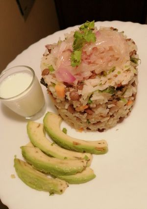 A picture of Mujaddara with caramelized onions & unsweetened yorghut.