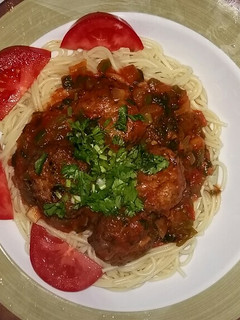 A picture of Meatballs in pizzaiola sauce.