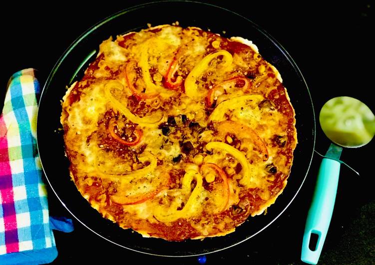 Step-by-Step Guide to Prepare Homemade Instant Cheese Veggie Pizza (No yeast)
