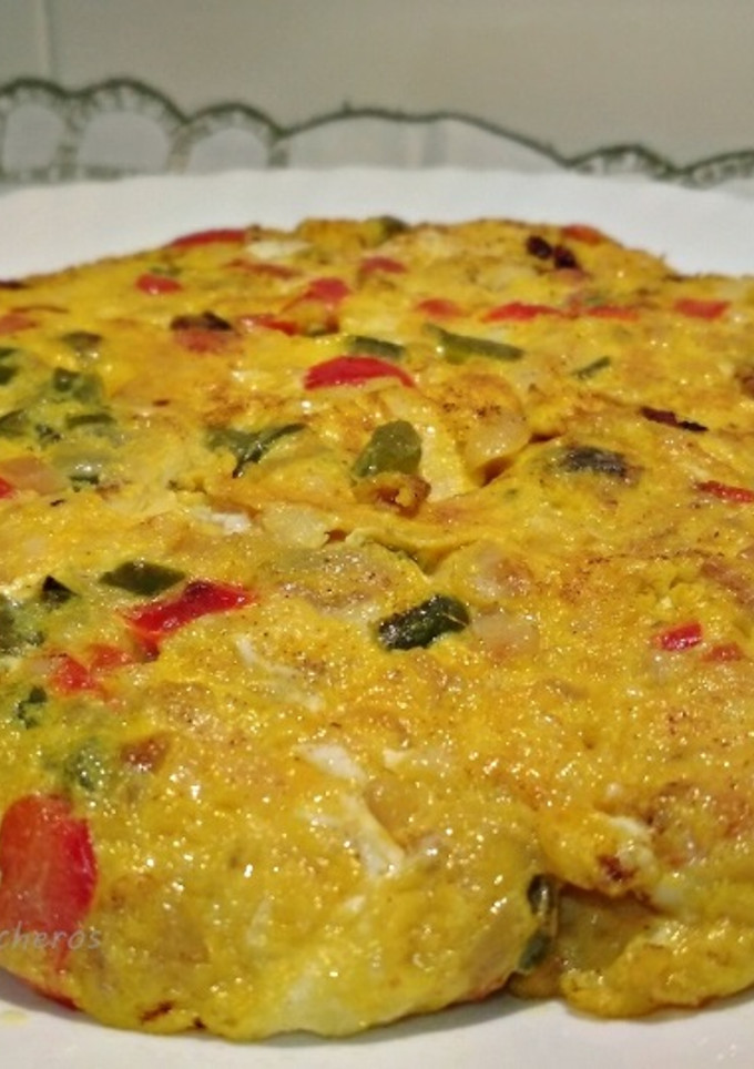 Una foto de Tortilla de bacalao con pimientos