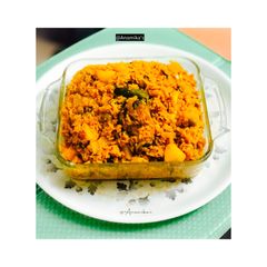 A picture of Muri Ghonto: Bengali Yellow Rice with Fish Head.