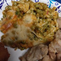 A picture of Yellow Rice and Lentils with Chicken.