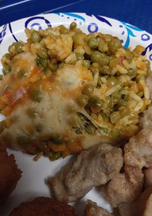 A picture of Yellow Rice and Lentils with Chicken.