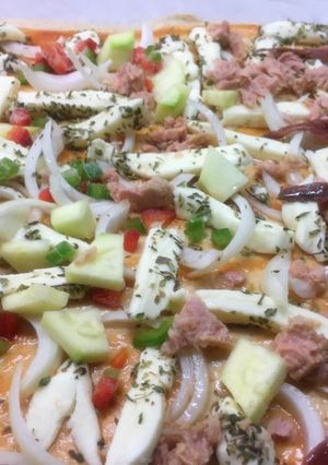 Una foto de Media pizza para cada uno