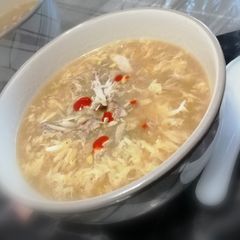 A picture of Chicken corn soup.