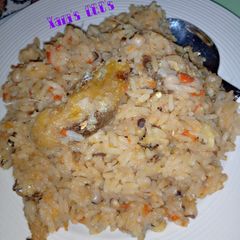 A picture of Jollof Rice with beans.