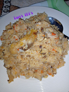 A picture of Jollof Rice with beans.