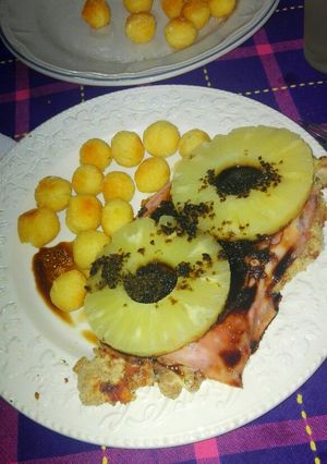 Una foto de Milanesa Tropical con papas Noisette