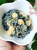 Mì than tre sò điệp xào bơ tỏi topping phomai rắc