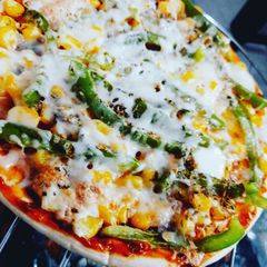 Capsicum corn and cheese pizza (readymade base) A picture of Capsicum corn and cheese pizza (readymade base).