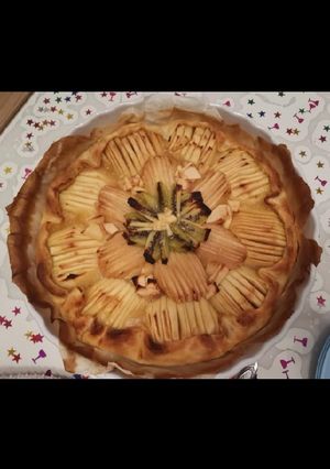 Une photo de Tarte pommes poires kiwis