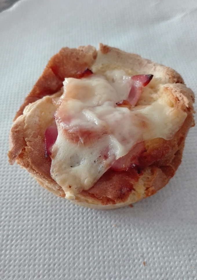 Una foto de Aperitivos de bacon y queso