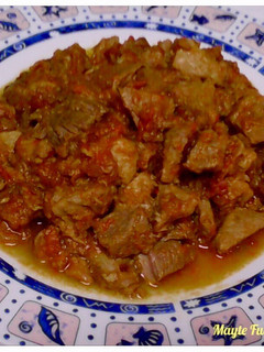 Una foto de Magro de cerdo con tomate