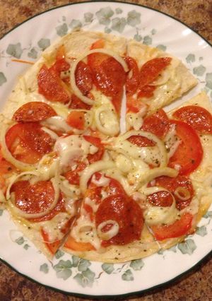 Una foto de Pizza al sartén