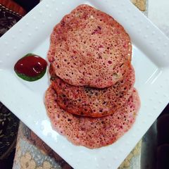 A picture of Beetroot mini uttapam.