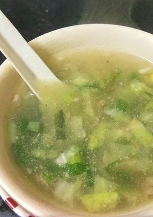 A picture of Chicken coriander sweetcorn soup.