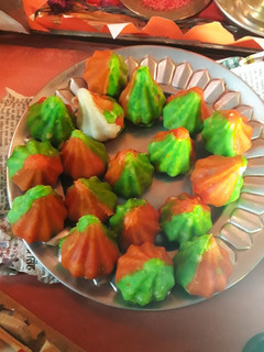 A picture of Tri colour mawa modak.