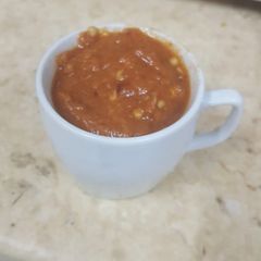 A picture of Momos spicy dip (Chutney).