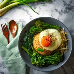 Ginger & Garlic Fried Rice With Egg & Steamed Vegetables A picture of Ginger & Garlic Fried Rice With Egg & Steamed Vegetables.