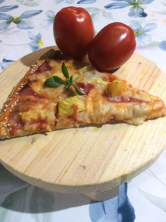 Una foto de Pizza
