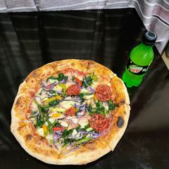 A picture of Baby Spinach Pan Pizza.