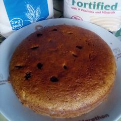 A picture of Lemon flavored Ugali cake with sultanas.