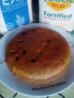 A picture of Lemon flavored Ugali cake with sultanas.