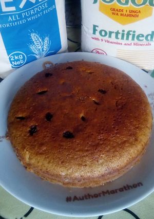 A picture of Lemon flavored Ugali cake with sultanas.