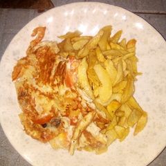 Chips with fried egg A picture of Chips with fried egg.