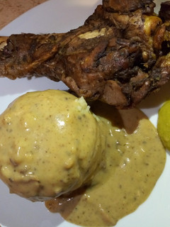 A picture of BBQ 🦃 turkey with roast gravy.
