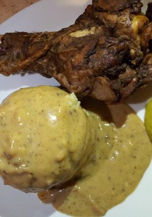 A picture of BBQ 🦃 turkey with roast gravy.