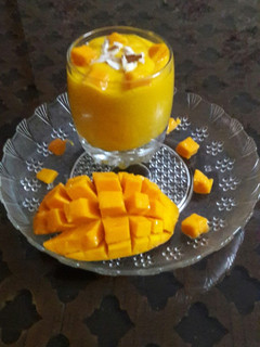 A picture of Alphanso Mango shake with vanilla ice cream.