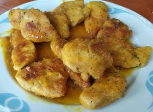 Una foto de Pechuga de pollo con zumo de naranja